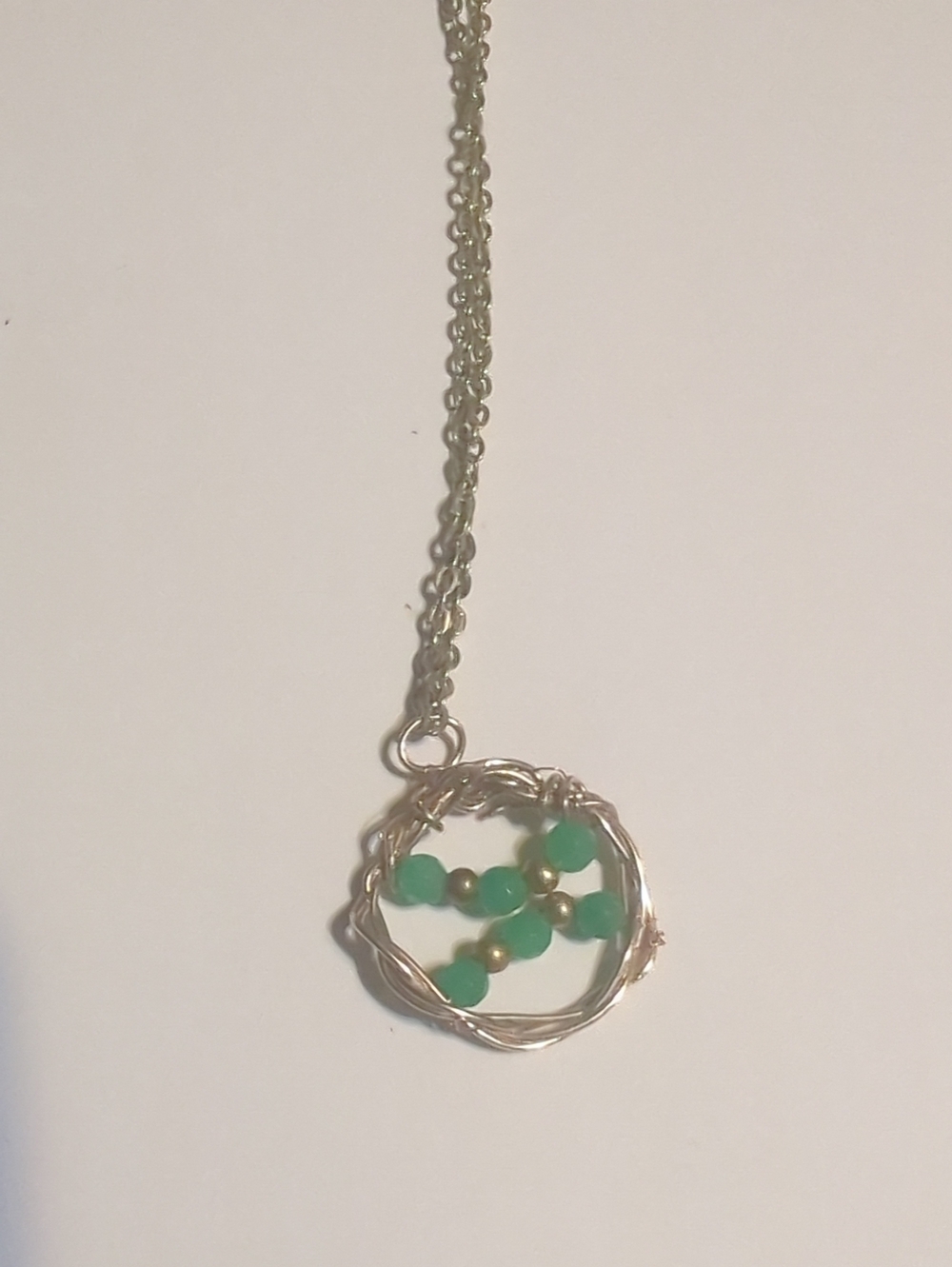 Gold-Tone Circle Pendant Necklace with Green Bead Accents